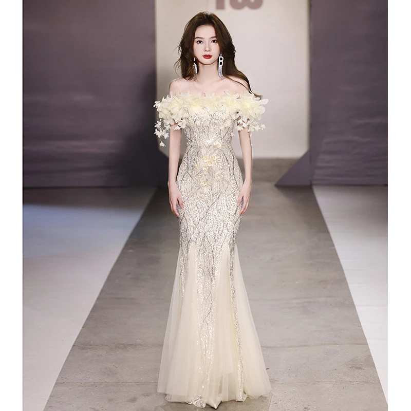 鱼尾晚礼服裙2025新款一字肩轻奢小众重工宴会成人亮片闪走秀礼服