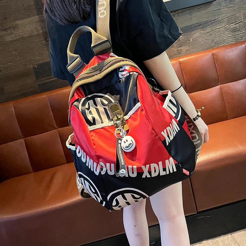 潮牌印花轻便双肩包女2023新款时尚休闲旅游高级感女士揹包旅行包