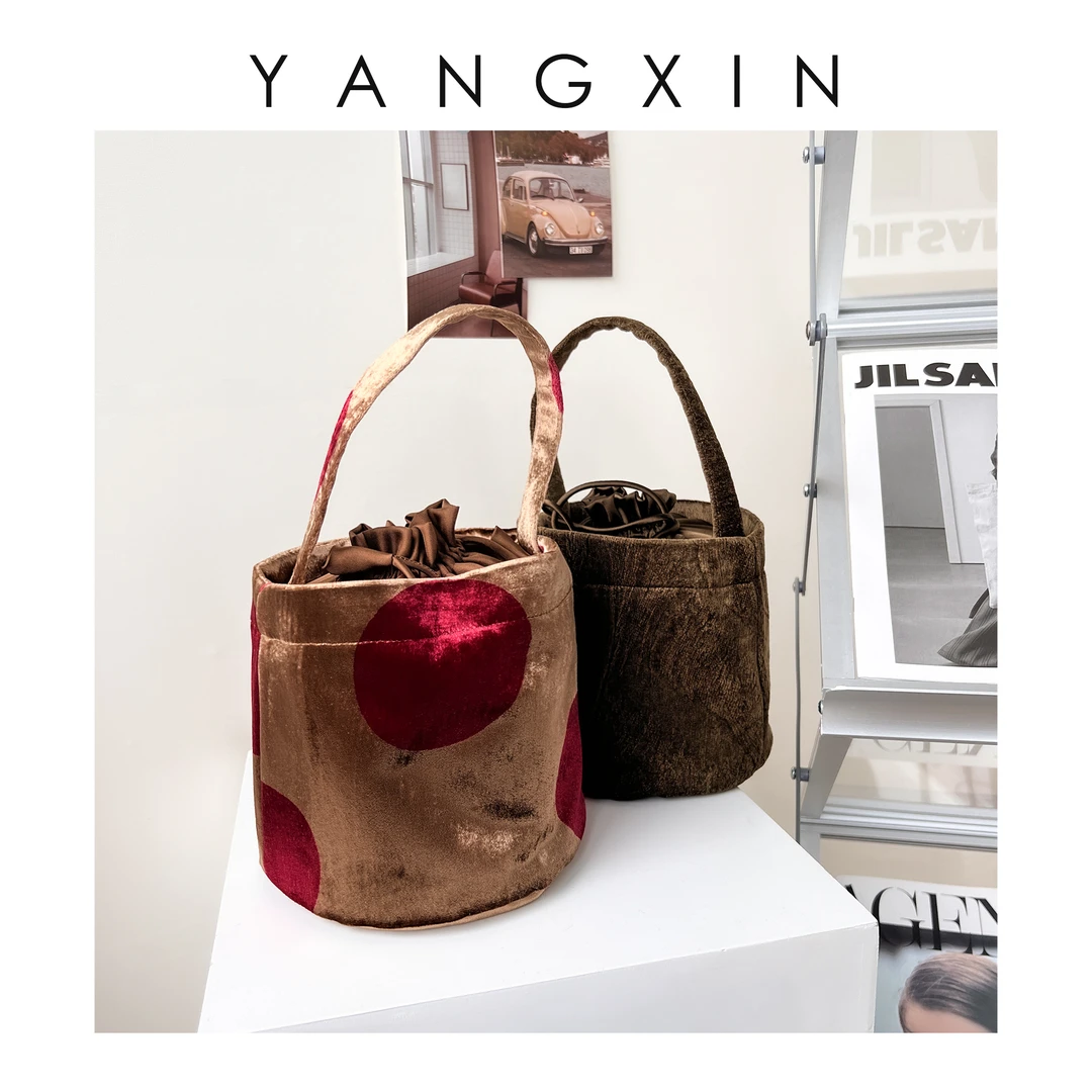 【无龄·杨昕】轻奢百搭时尚流潮圆桶袋口抽绳手提包