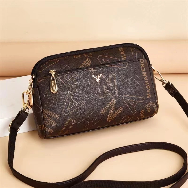 经典百单麦字母妈妈包