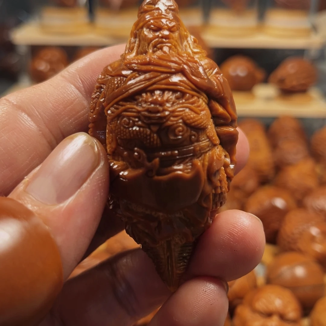 橄榄核核雕陈*的关公