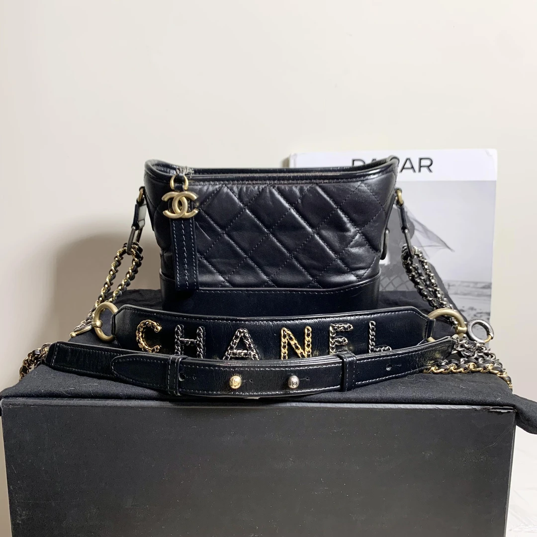99新 Chanel/香奈儿 壹臻/黑金哞手柄流浪小号 29开 64823986