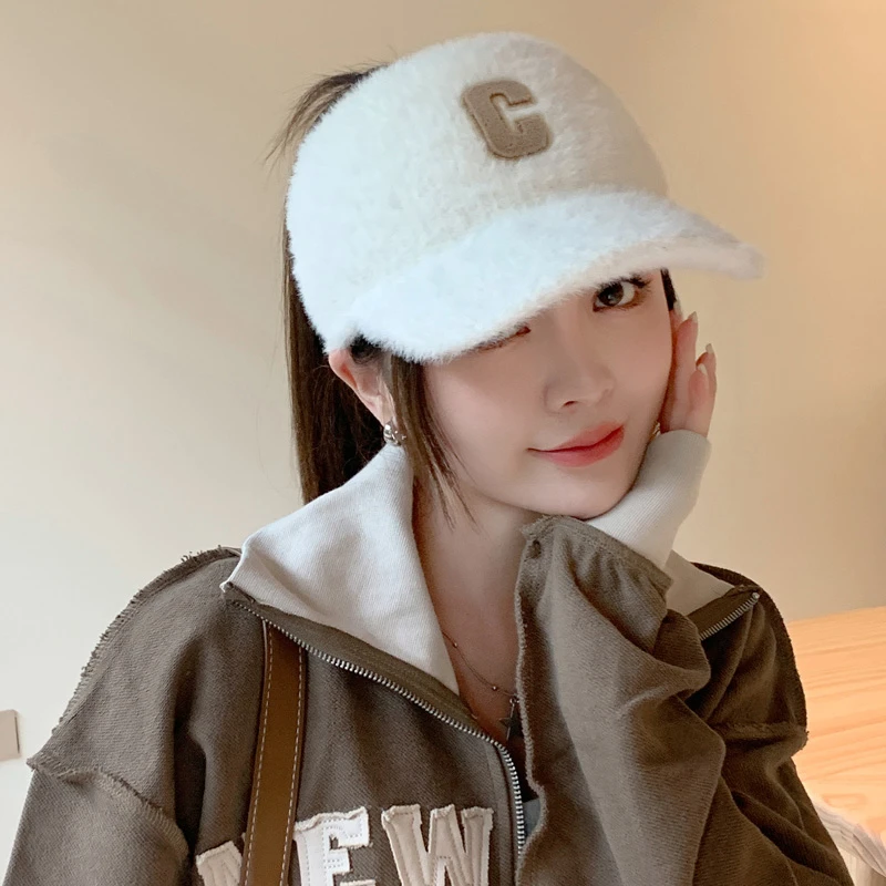 冬季保暖空顶帽子女韩版加厚保暖护耳鸭舌帽扎高马尾无顶帽骑车帽