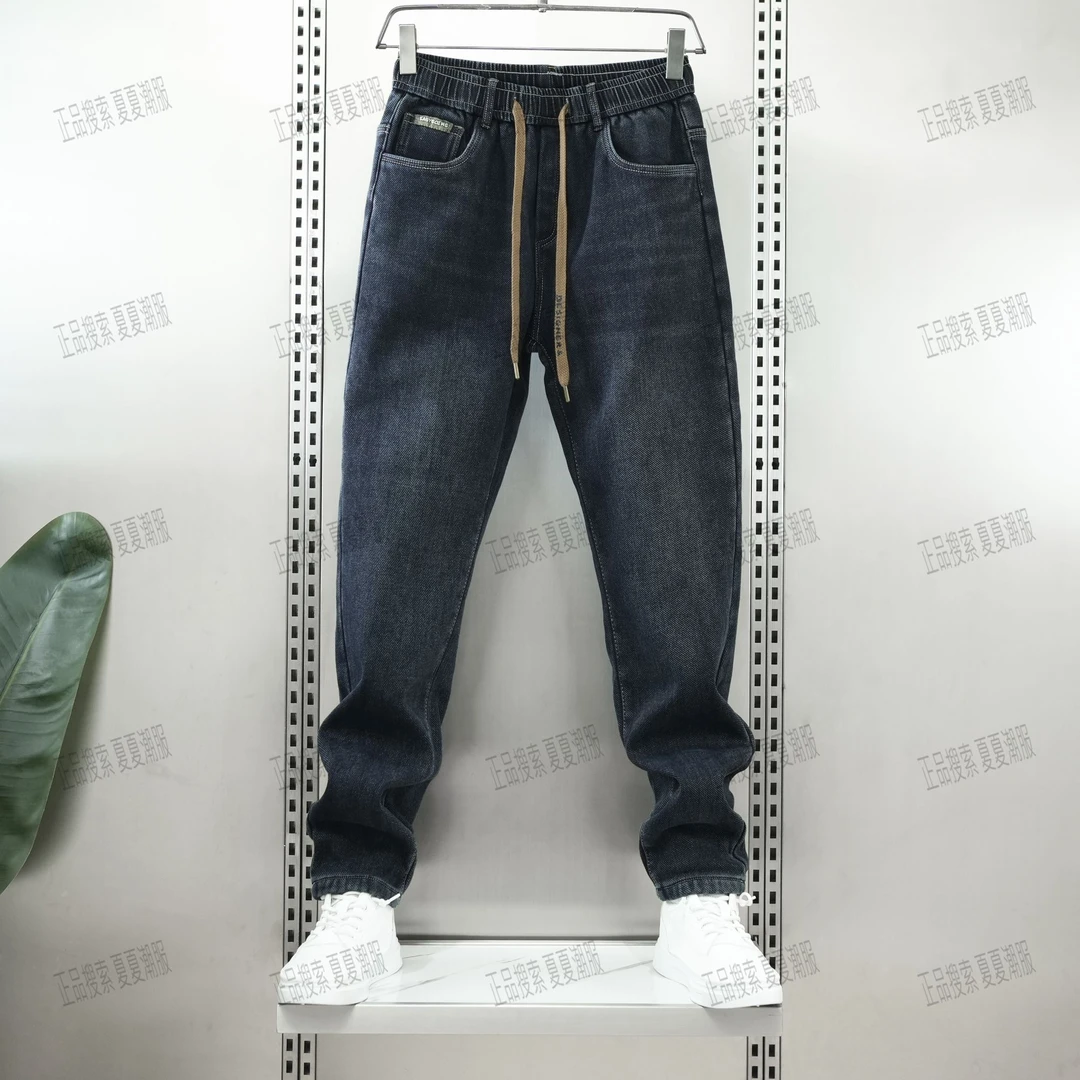 四季新款男士男款猫须水洗宽松显瘦潮流百搭松紧腰微锥牛仔裤