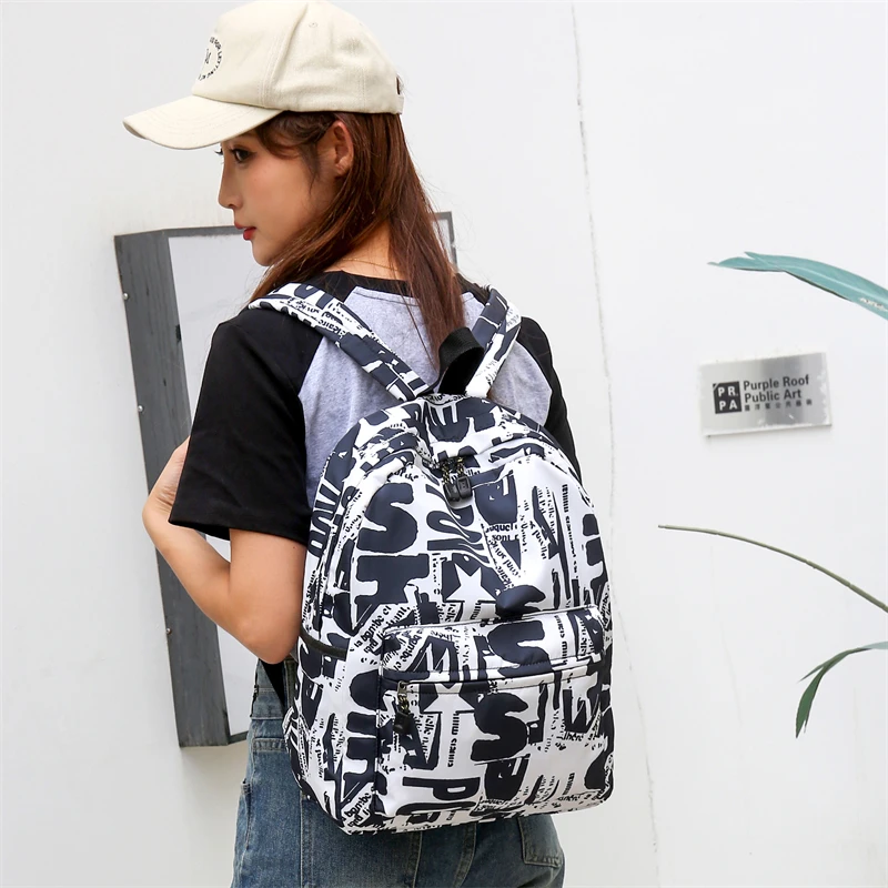 书包女包通用男女背包小学生初高中学生双肩包电脑包情侣旅行包包