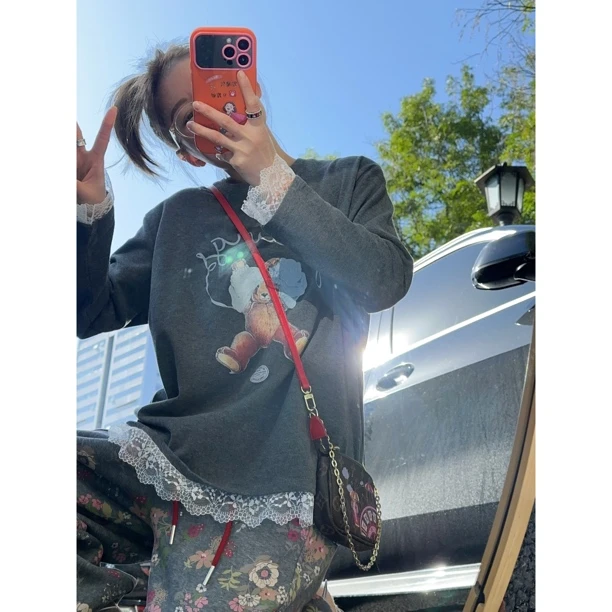 【Z.D.C】蕾丝边拼接卡通图案长袖T恤/韩版减龄宽松百搭