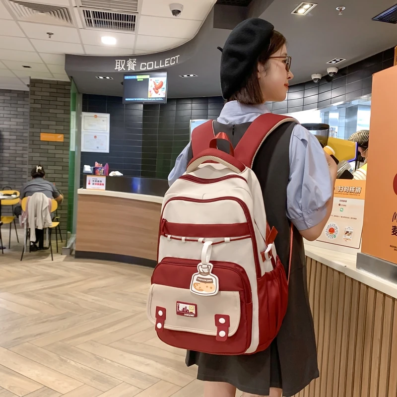 高颜值工装书包轻便防水减负护脊背包大容量时尚百搭双肩包大学生