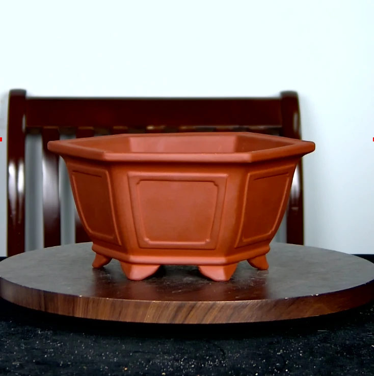 内对角17.5，内对边15.5，内高8cm紫砂红清水宽口带线，奎面六方花盆