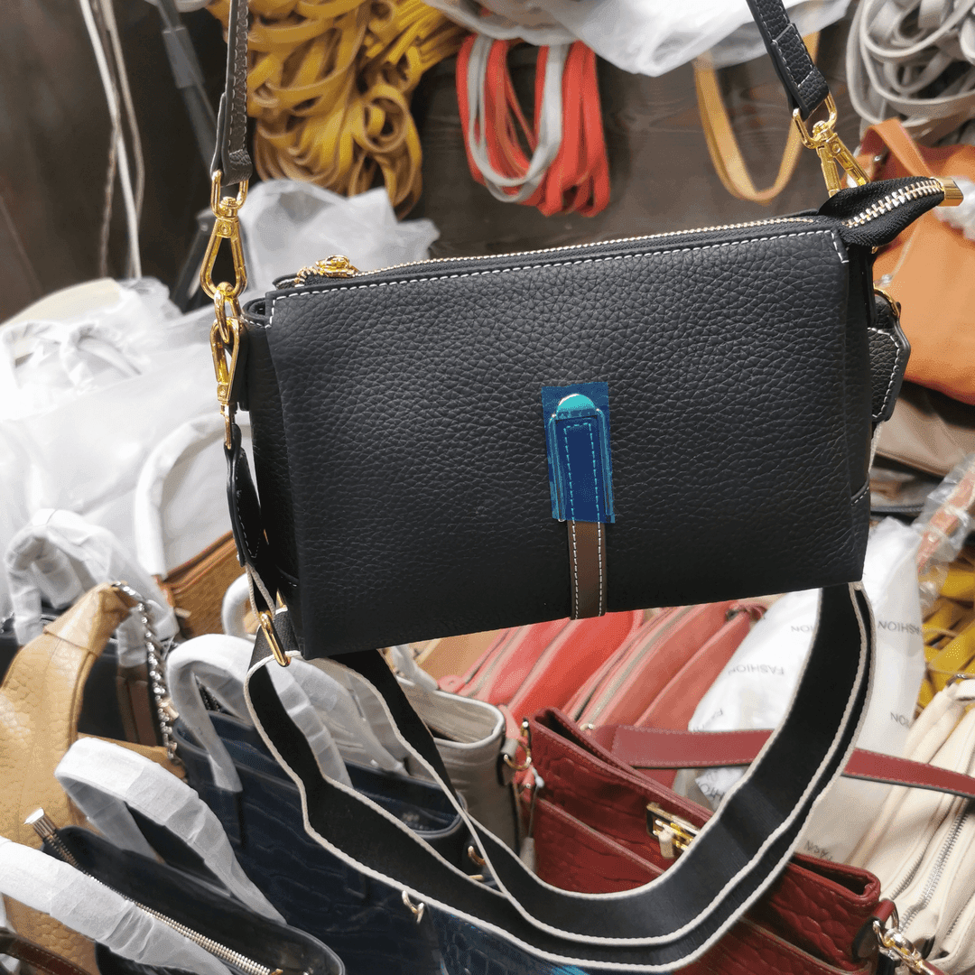 头牛拉链多隔层简约休闲斜挎包腋下包单肩包底宽23高度15厚10Cm