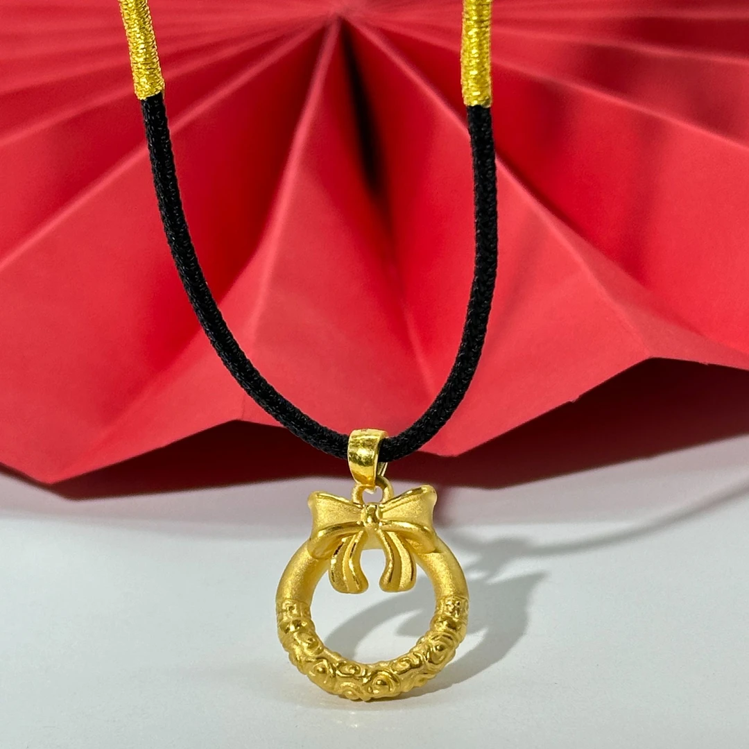Chow Tai Seng/周大生足金蝴蝶结平安扣百搭编织编绳精美时尚项坠