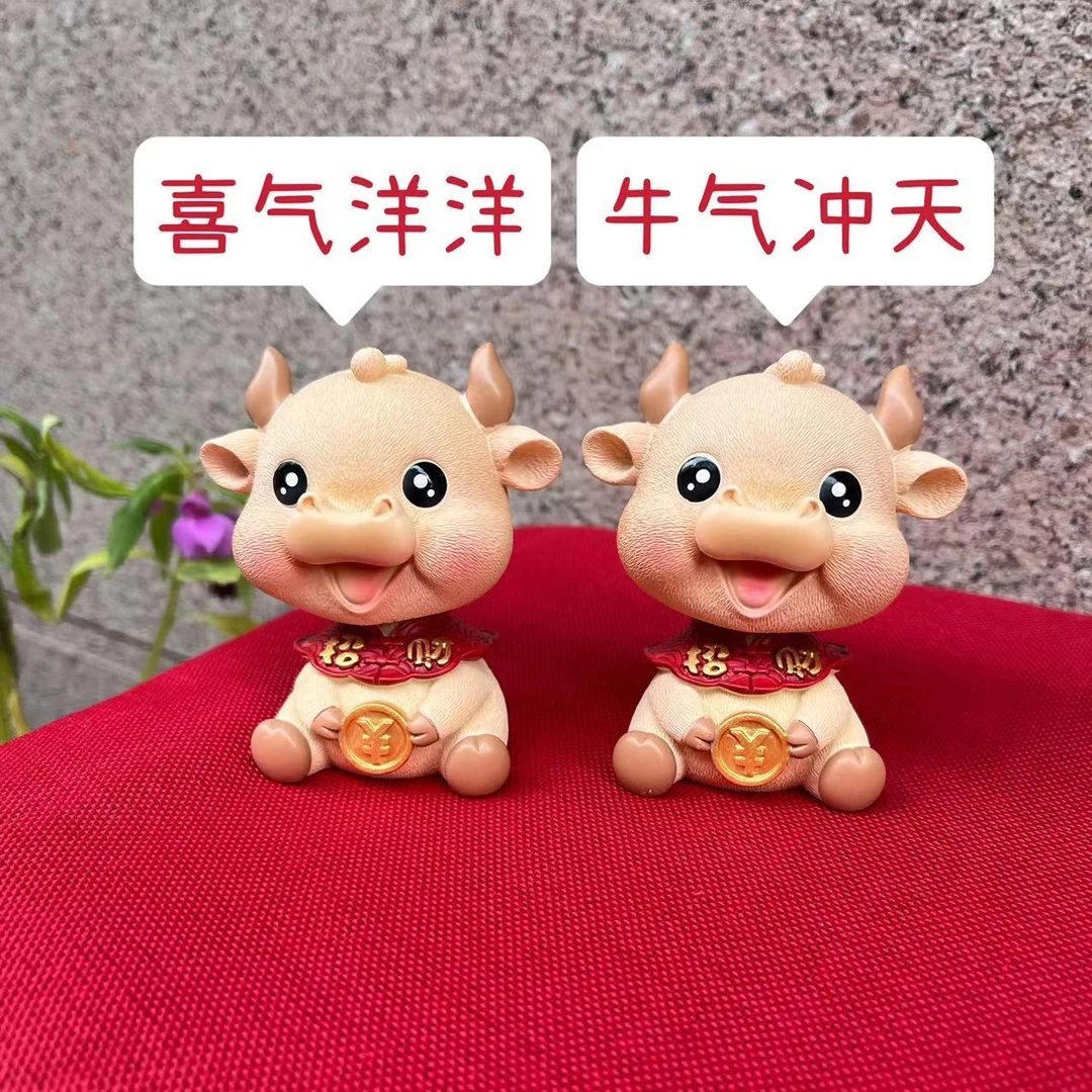 小福牛摇头摆件汽车内饰品创意树脂小牛办公桌车载可爱装饰用品