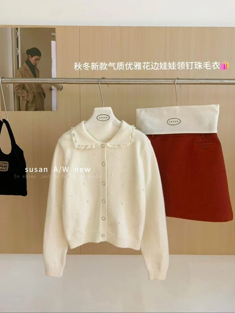 7331  秋冬优雅花边娃娃领珍珠毛衣（衣长58）  su