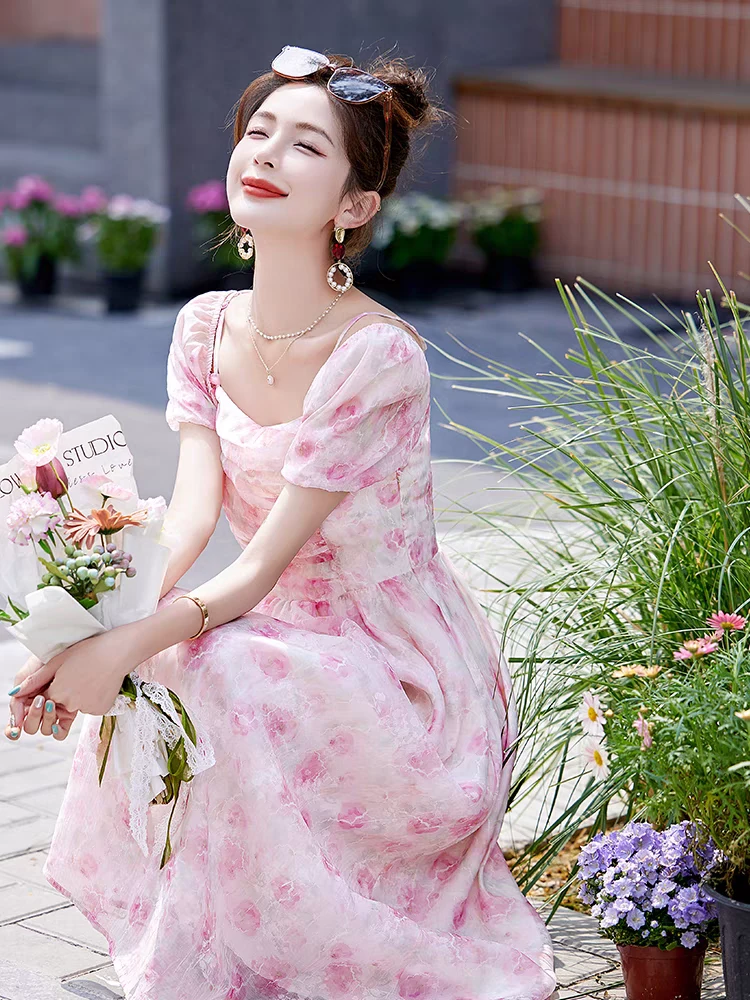 度假风雪纺连衣裙夏2024新款时尚气质碎花吊带一字肩大摆长裙子女