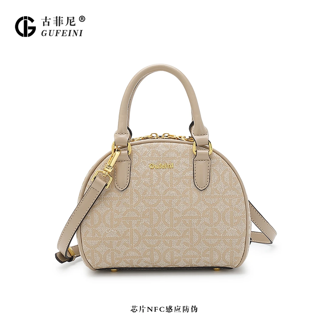 Gufeini/古菲尼新款小众时尚单肩斜挎包包手提大容量小圆包9308