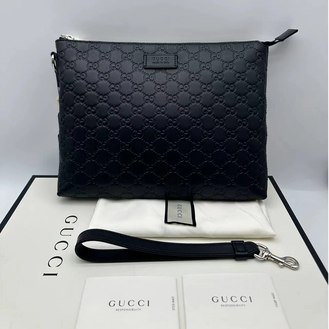 99新 GUCCI/古驰 压花全皮黑色手拿包/经典男士时尚休闲黑花/1608