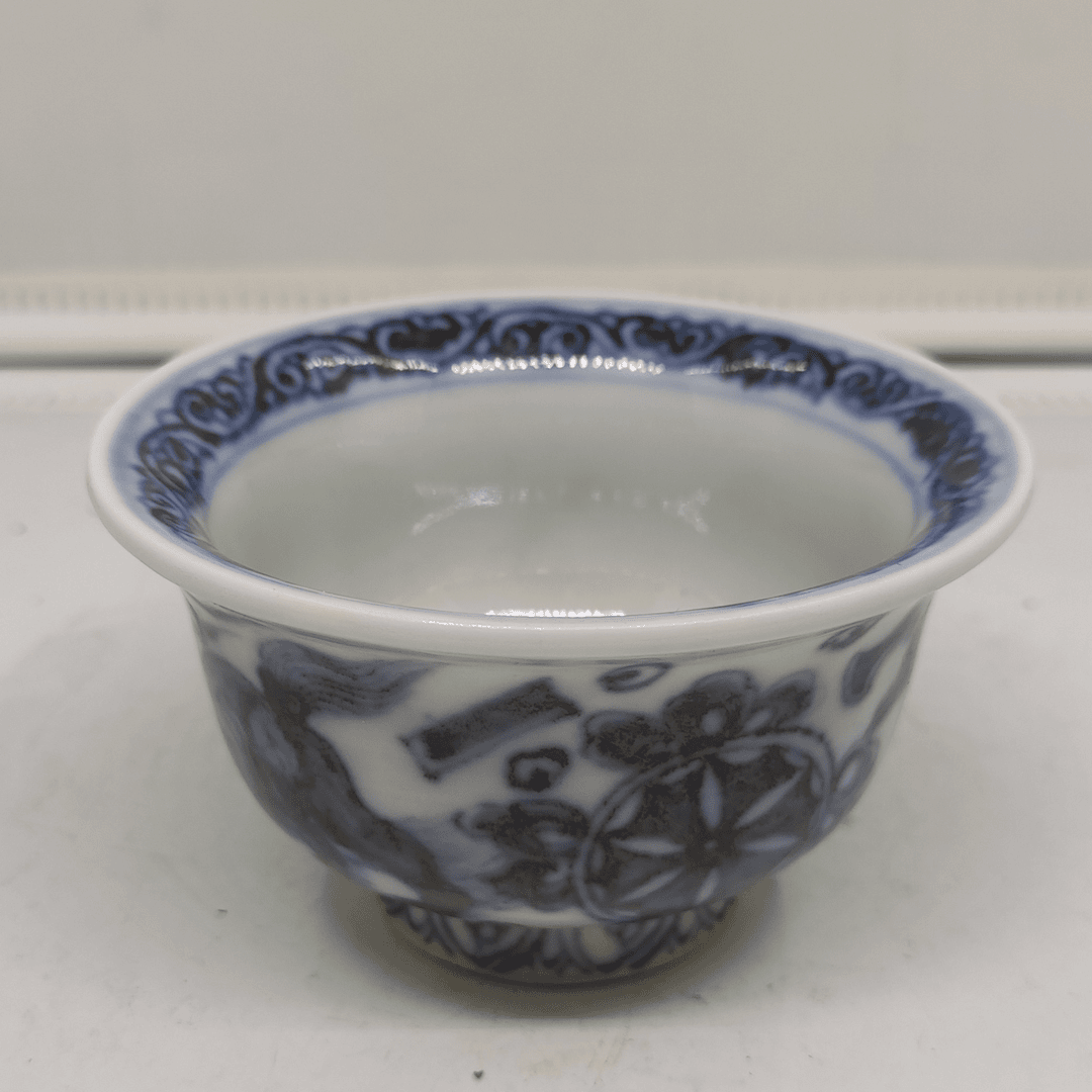 明永乐青花双狮绣球纹压手杯