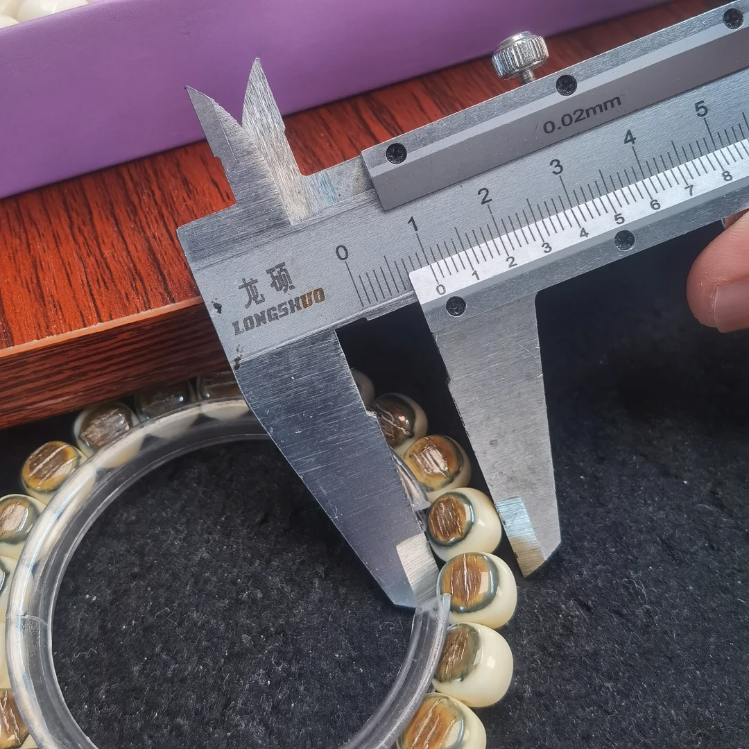 猛犸牙蓝眼10直径手串冰料假一赔四