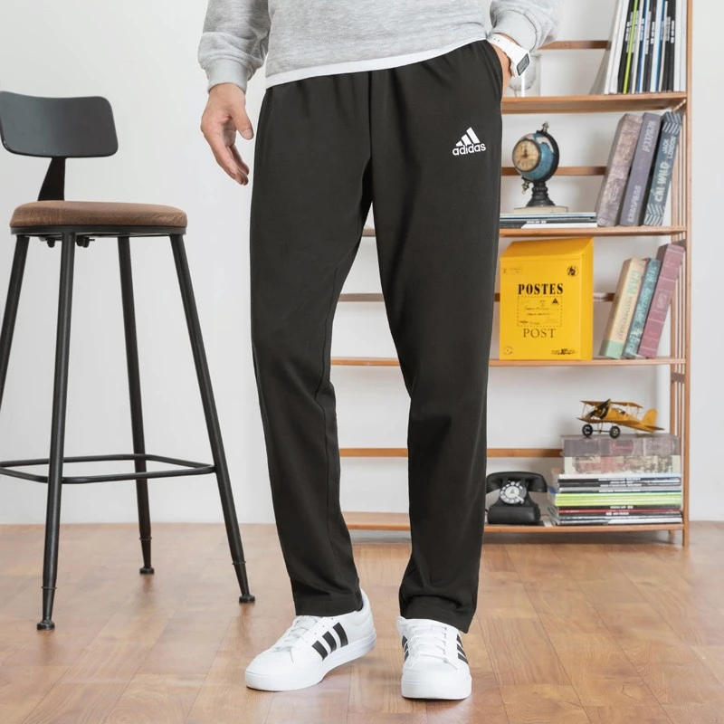 【优选】Adidas阿迪达斯裤子男裤运动裤宽松直筒裤针织长裤GK9222