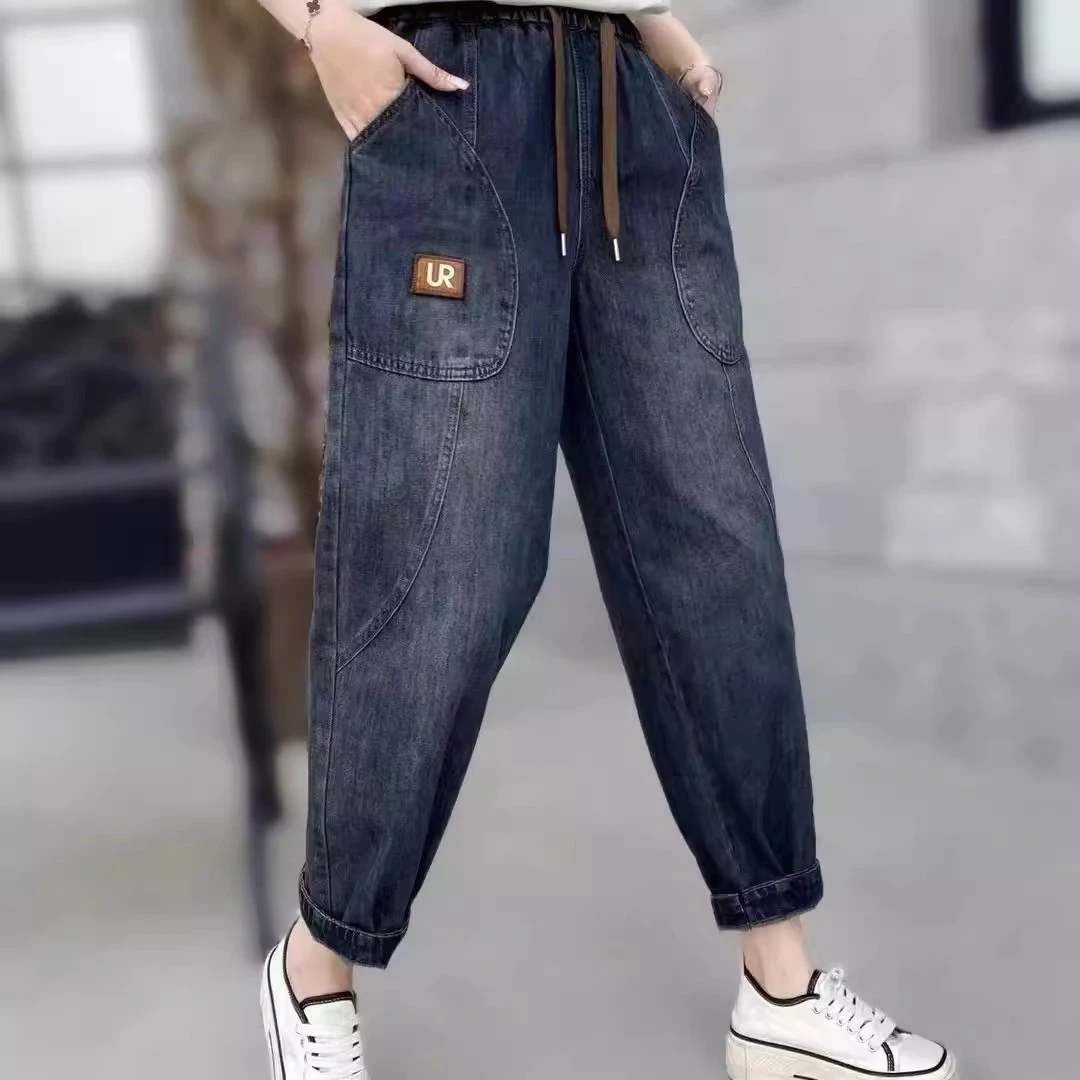 水洗牛仔裤女早秋款洋气显瘦松紧腰哈伦裤中年妈妈装宽松大码裤子