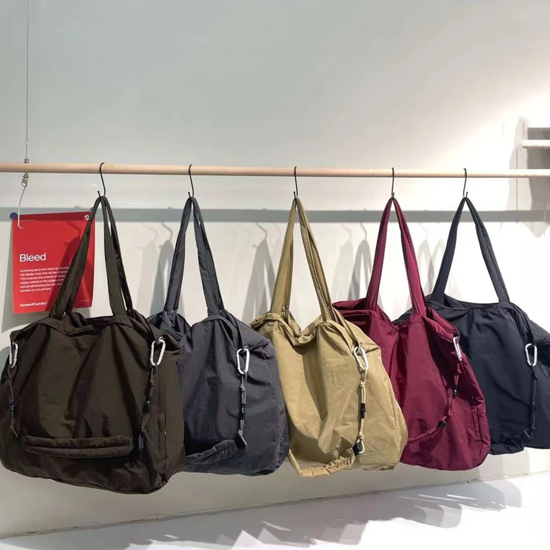 原创单肩斜挎两用包轻便简约大容量肩带可拆卸时尚百搭尼龙托特包