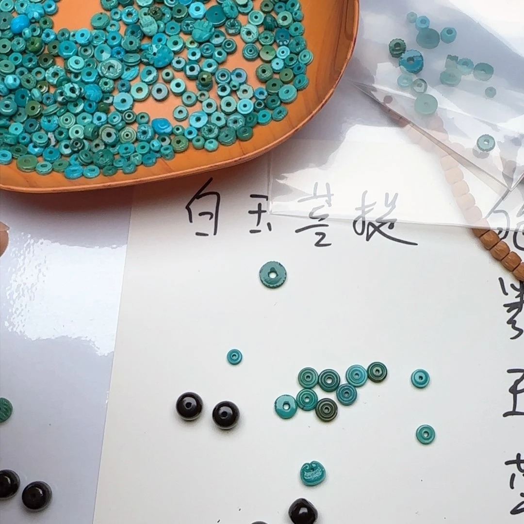橄榄核核雕听*风雕刻羽毛