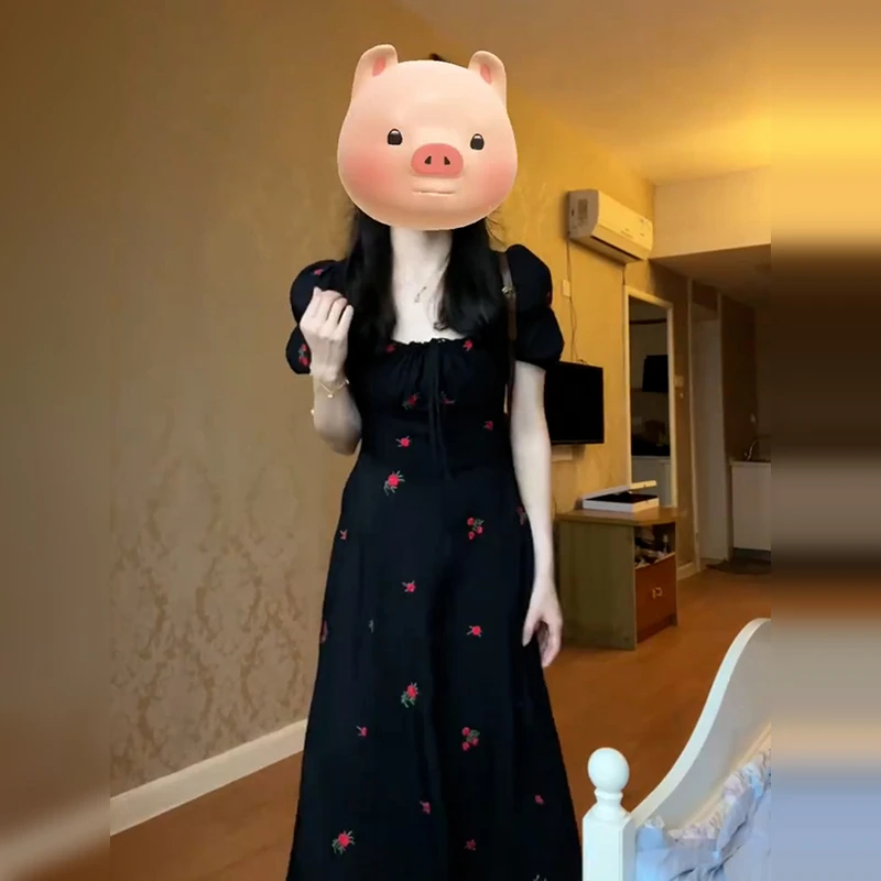 茶歇法式赫本风黑色碎花连衣裙子女夏季2024新款气质长裙1749