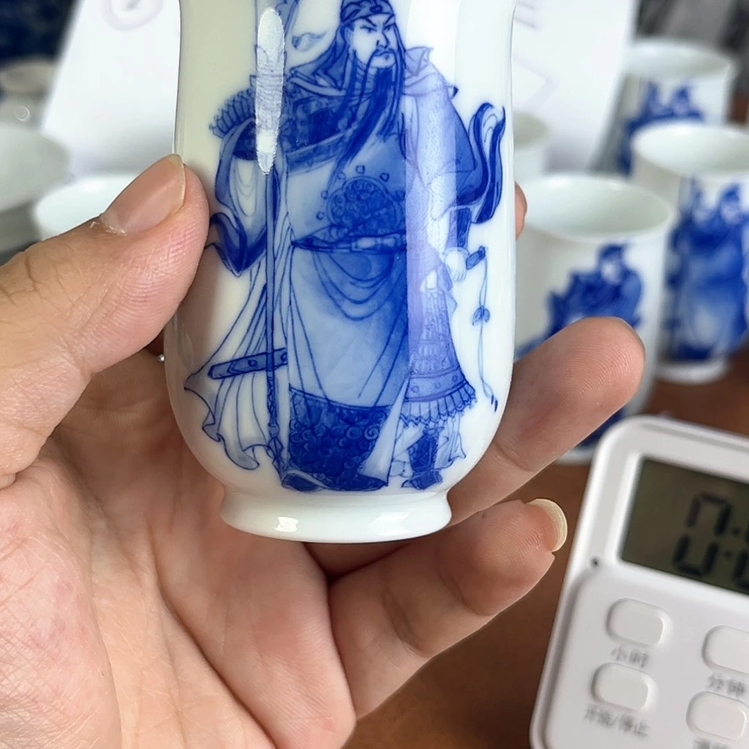 珠****阳青花人物关羽杯子
