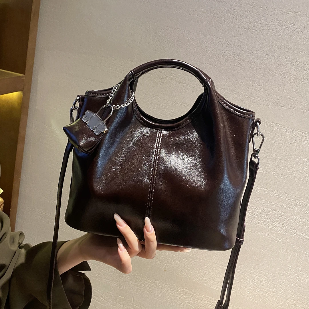 时尚百搭牛皮真皮小众单肩女士简约休闲轻奢包包韩版斜跨1108