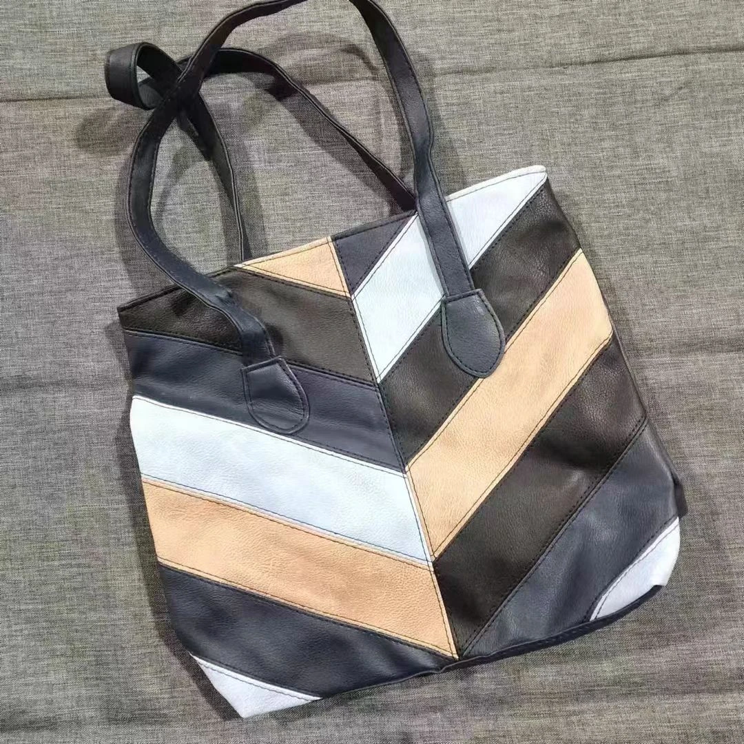 包11 深蓝黑色蓝色咖色拼接手拎包