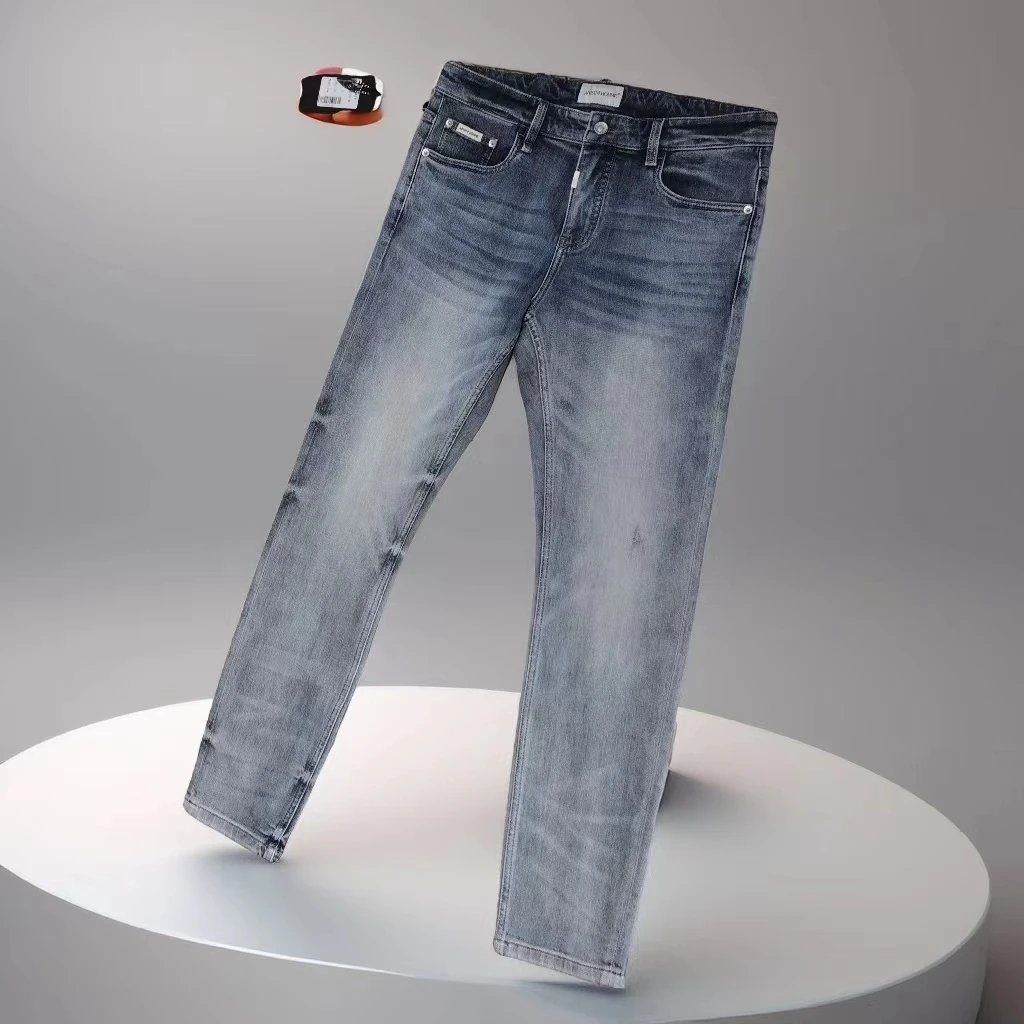 春夏男牛仔裤子时尚休闲修身蓝色直筒破洞水洗