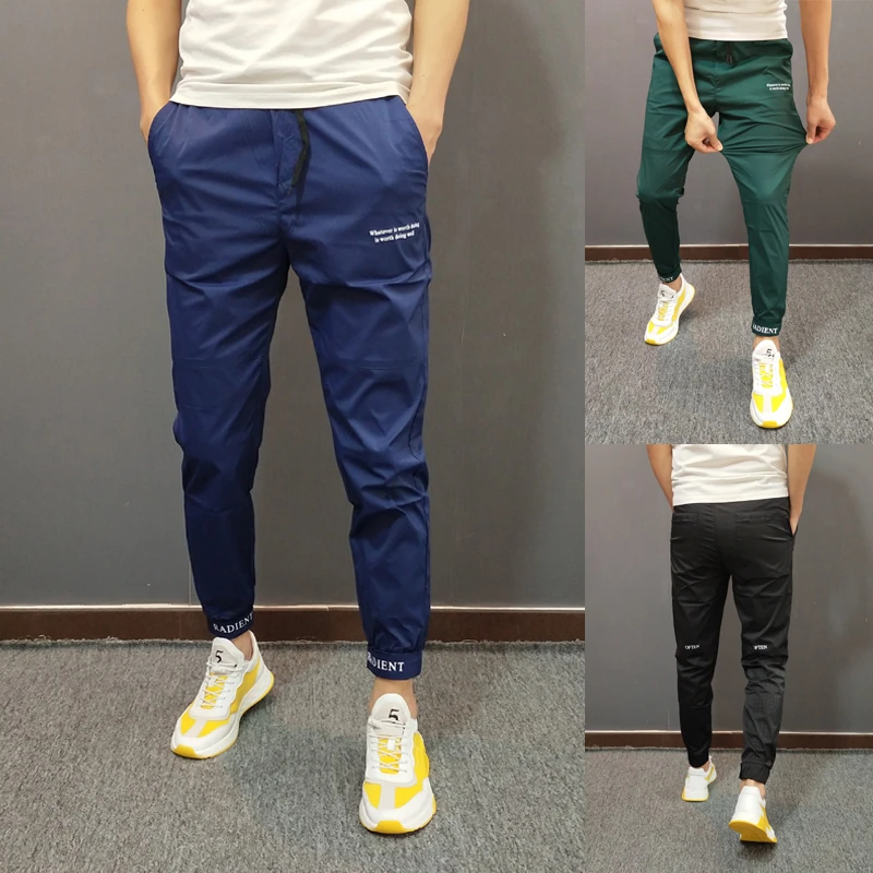 夏季薄款冰丝速干裤男透气网眼空调裤休闲印花裤子修身镂空九分裤