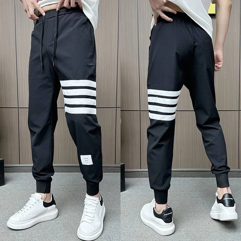 夏季薄款冰丝速干休闲裤男士修身显瘦四道杠运动束脚裤百搭潮流