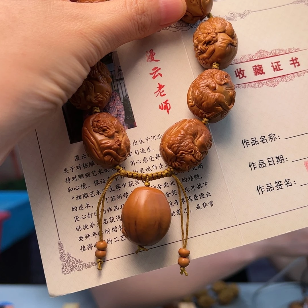 橄榄核核雕俗****)橄榄核