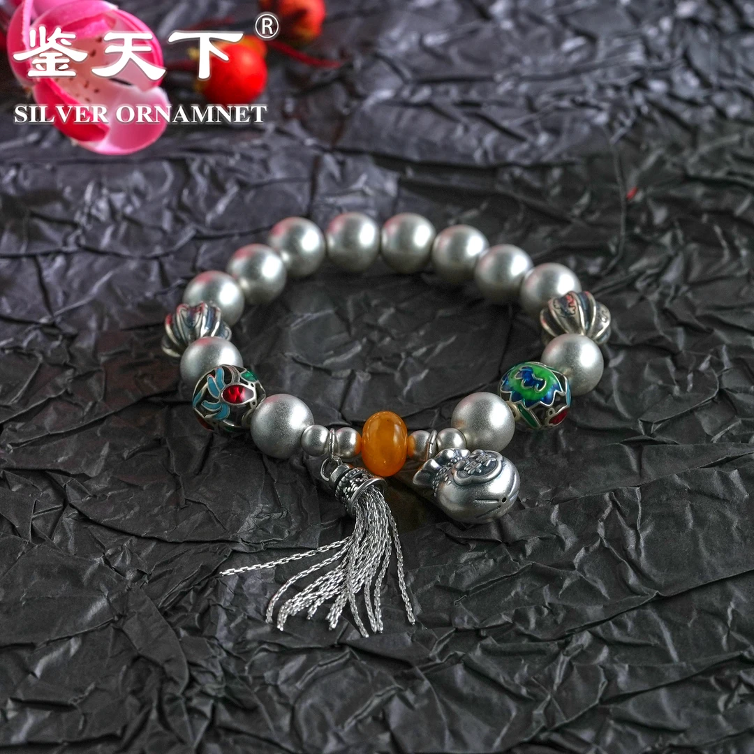 925银珐琅手链 【鉴天下】镂空双鱼圆球平安福袋流苏手链06300044
