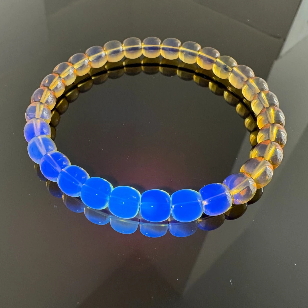 《石鼎莹星》净水S级精工高庄缅金蓝蓝珀手串老型多样性发其中一件