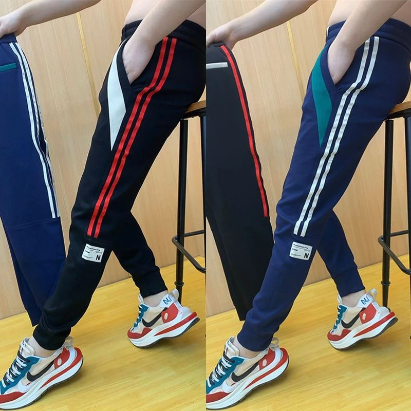 春季新款宽松束脚休闲裤男士潮流百搭个性拼色运动卫裤痞帅哈伦裤