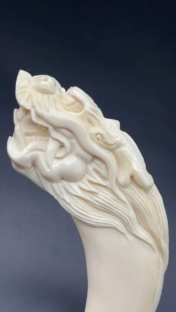 60967精品猛犸牙雕刻龙型牙尖把件