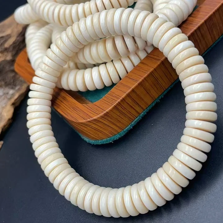 61208精品猛犸牙纯手工10*3.5左右药片手串（微瑕）