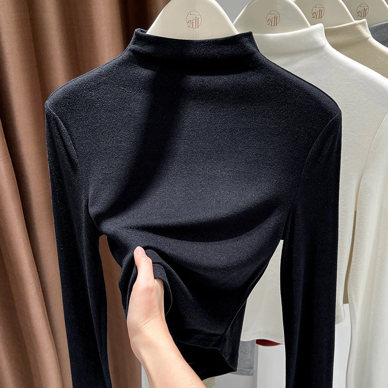 黑色高档修身内搭半高领德绒上衣女2025年秋冬弧形下摆保暖打底衫