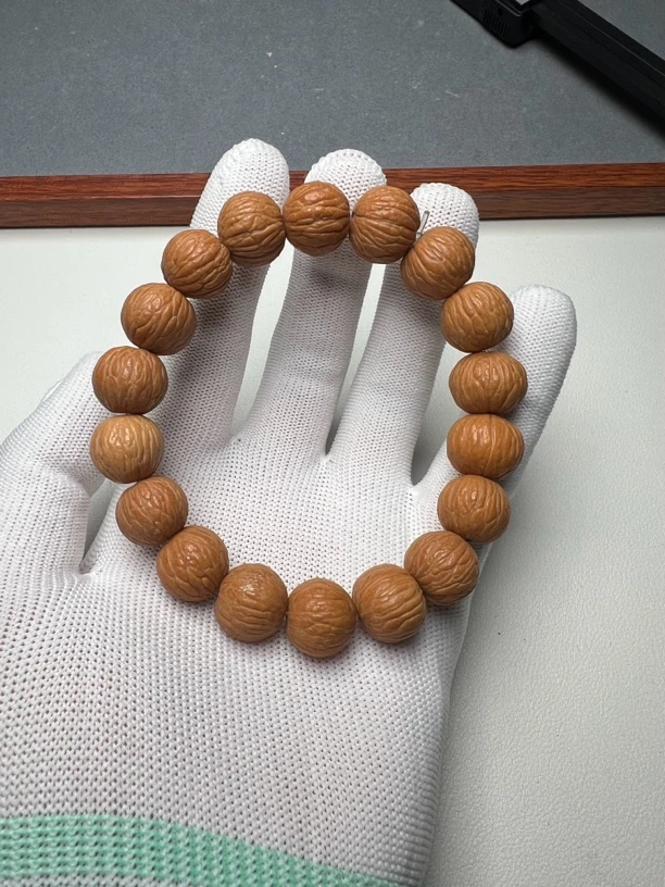 猴头手串：凤羽猴头