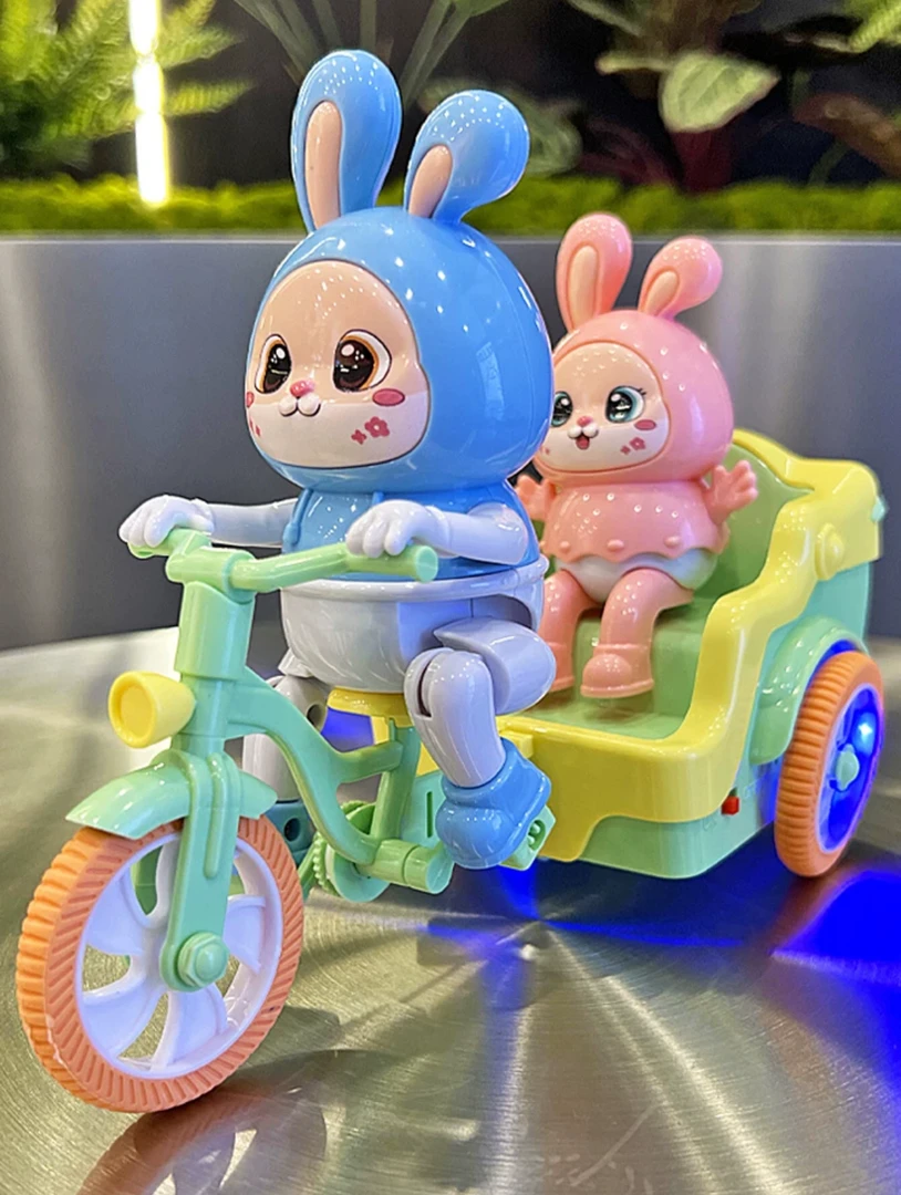 儿童电动可爱小兔子踩三轮车玩具带音乐灯光卡通男女孩旋转特技车