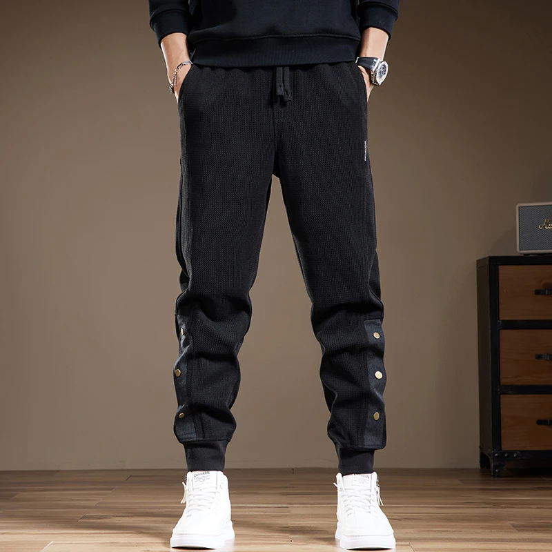 高级感提花针织休闲裤男士秋冬新款宽松大码潮牌拼接排扣束脚裤子