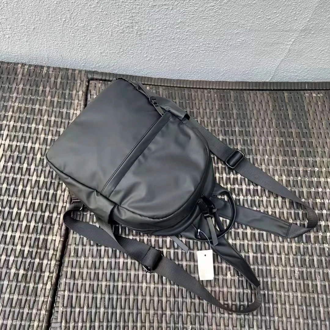 新款百搭防水面料大容量男女同款双肩包《W7791》