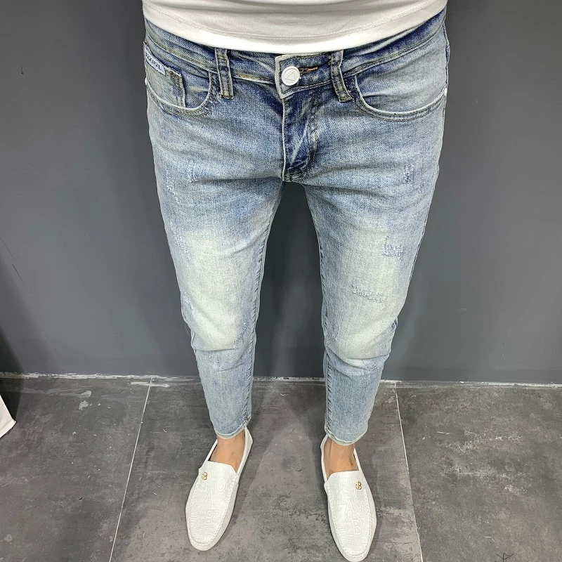新款流行男士牛仔裤韩版潮流水洗浅蓝色修身小脚弹力百搭九分裤子