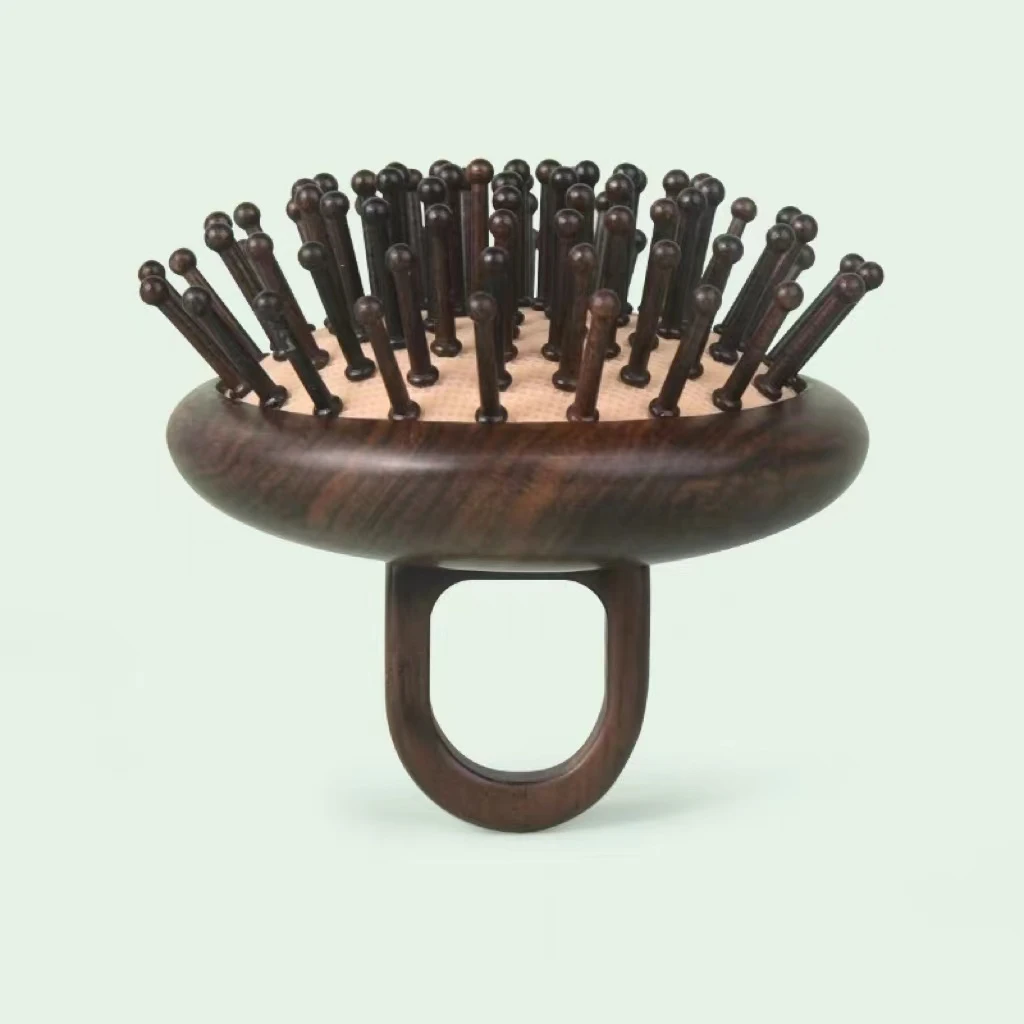 紫光檀气垫按摩梳头疗小型便携多功能颈肩手持式