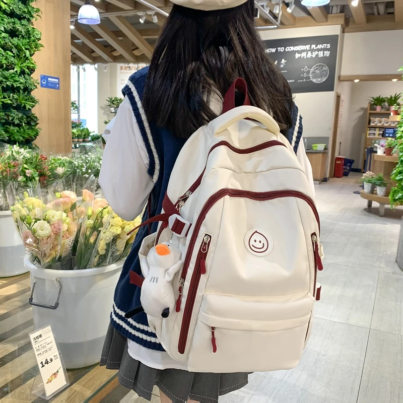 女书包双肩包百搭大学生高颜值韩版初中生中学生大容量背包可爱风