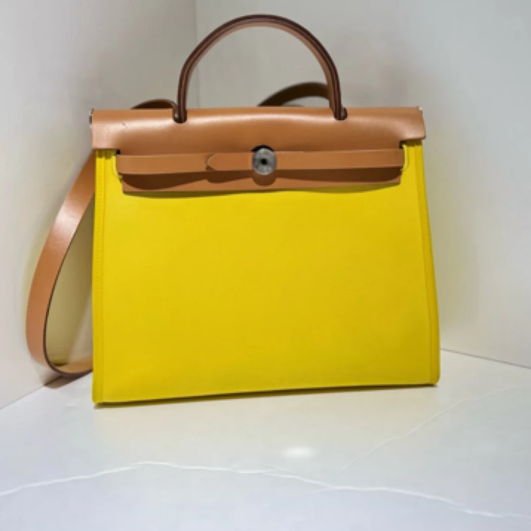 99新 Hermes/爱马仕 herbag31柠檬黄银扣A手提包