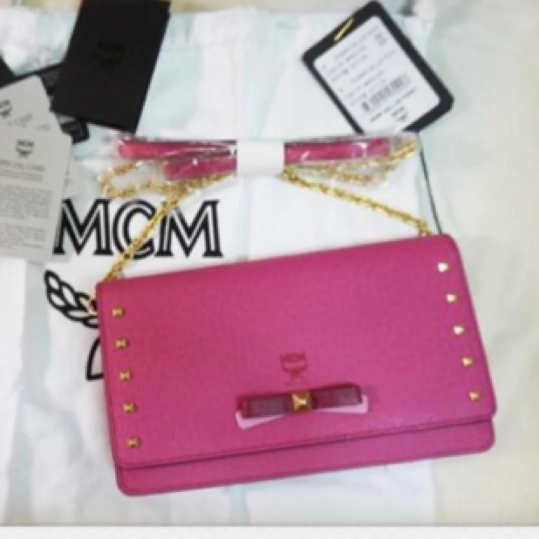 95新 MCM MCM粉色斜挎包