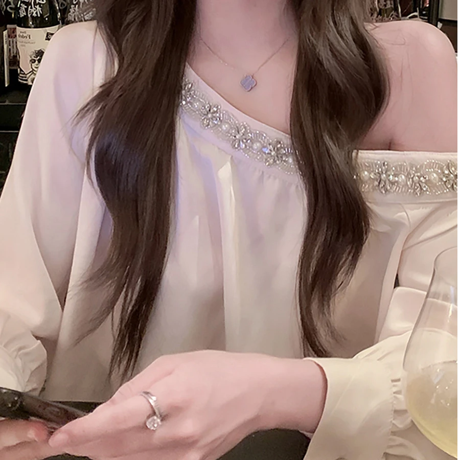 独特别致重工镶钻斜边长袖甜美雪纺衬衫不规则缎面露肩洋气上衣女