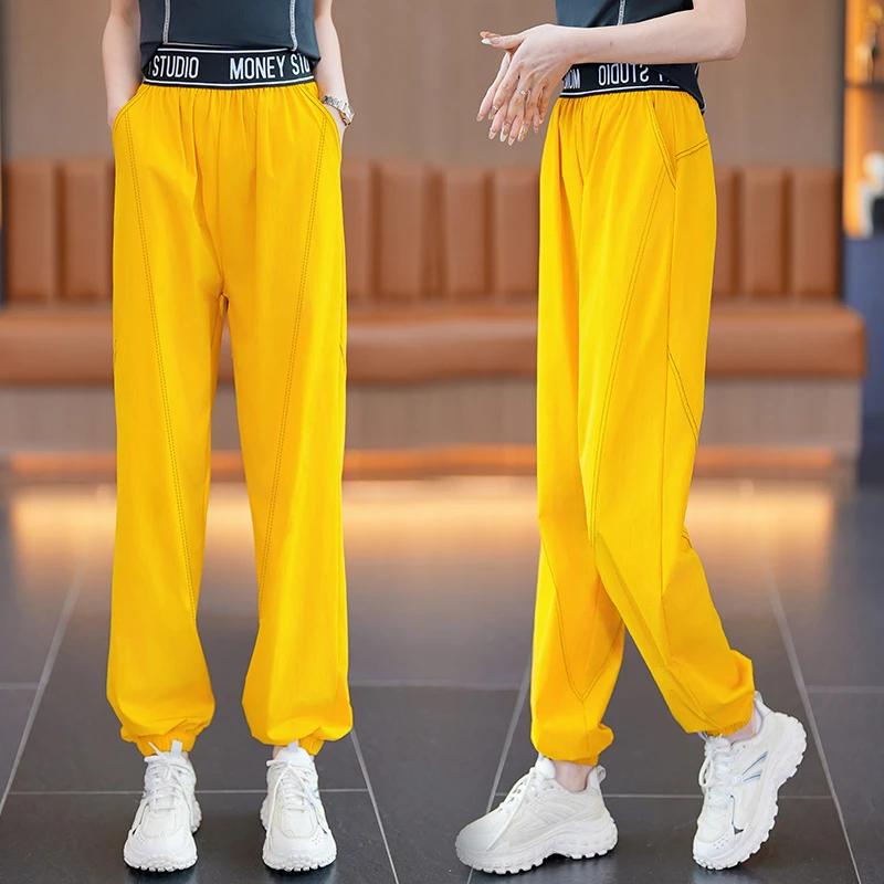 夏季健身速跑步裤裤子拼接时尚休闲宽松拨款梭织速干运动裤长裤女